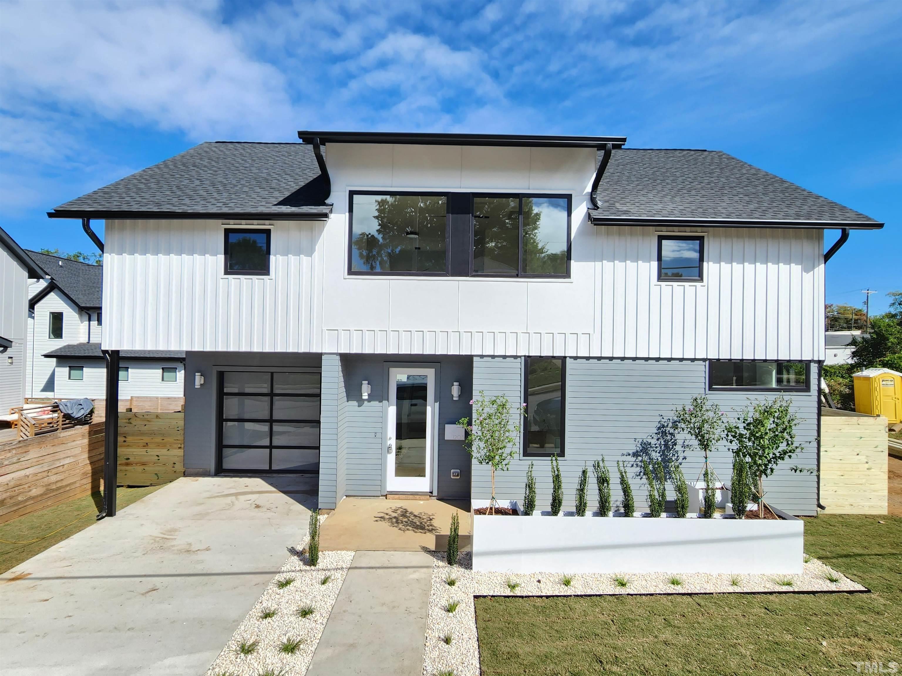 a house view with a garden space