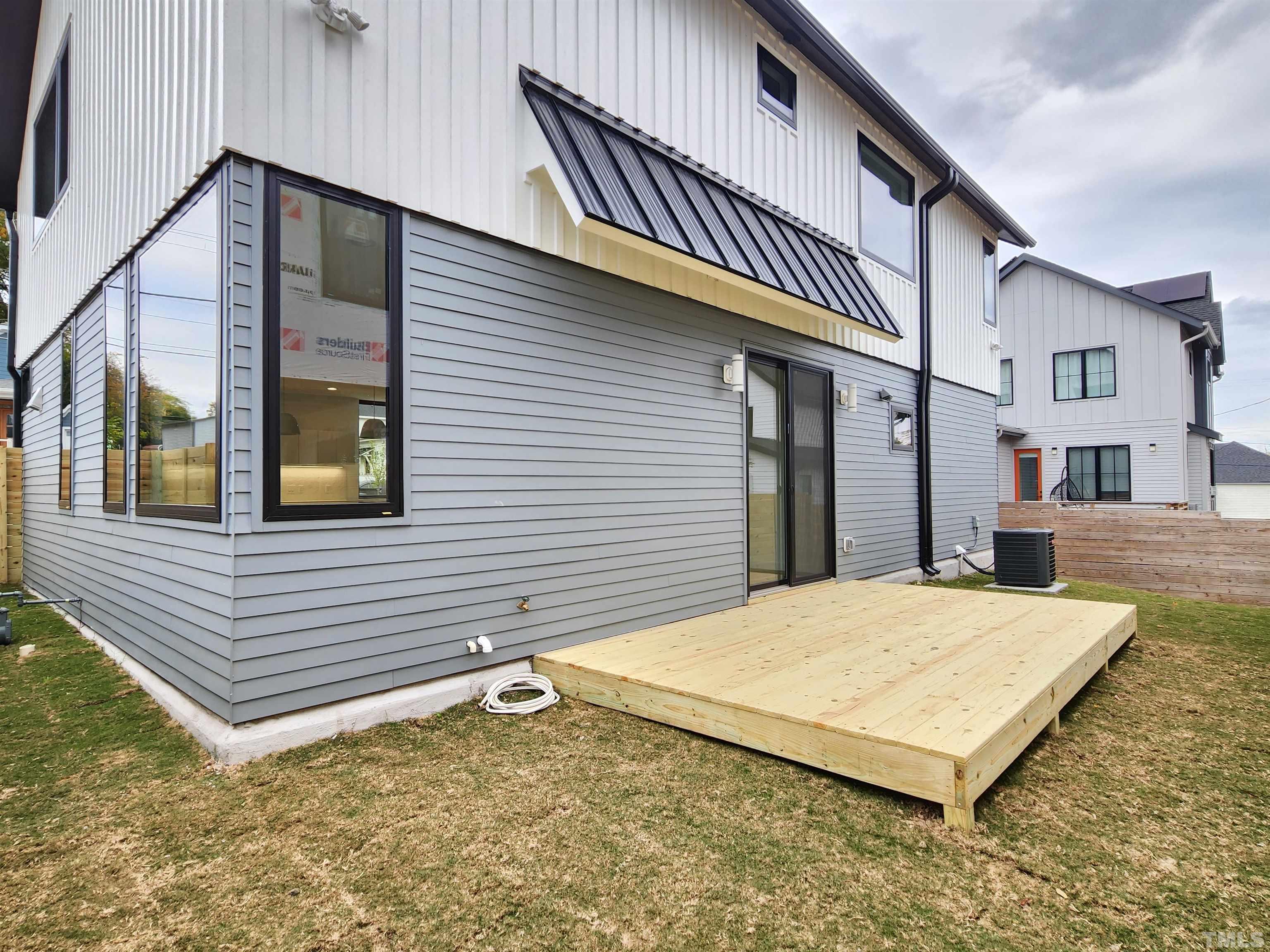 1203 East Lane Street Raleigh, NC 27601 - Photo 23 of 24 a view of a house with a balcony