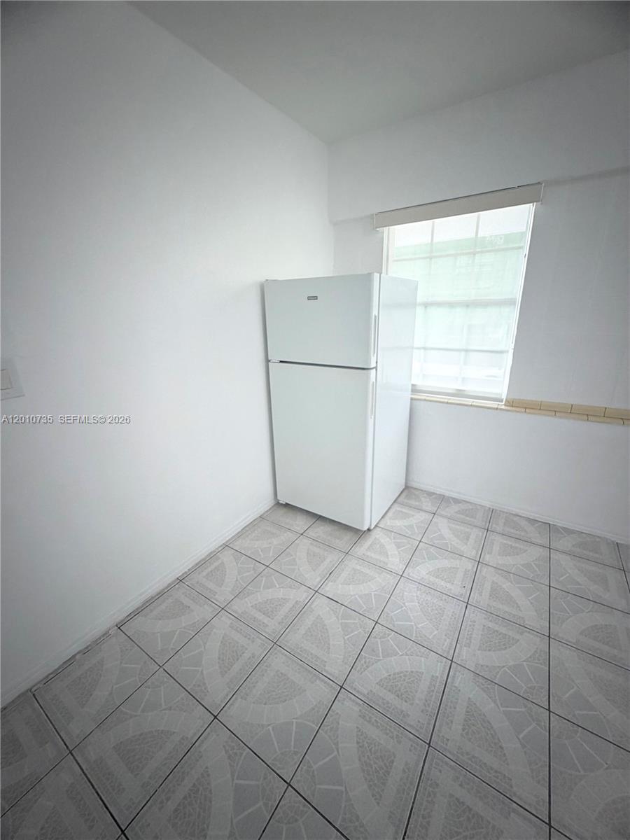 2736 Southwest 22nd Avenue, Unit 2 Miami, FL 33133 - Photo 7 of 12 a view of a kitchen with a sink