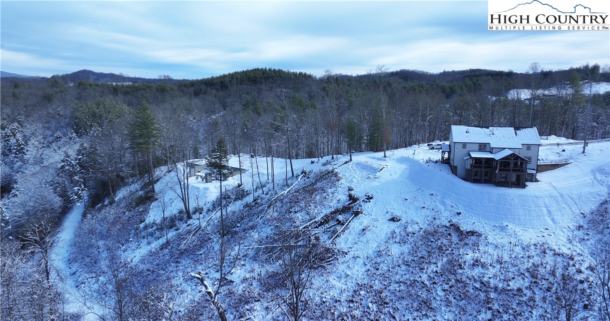 56 Autumn Leaf Way Crumpler, NC 28617 - Photo 24 of 44 a view of a backyard with green space