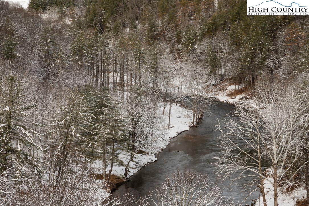 56 Autumn Leaf Way Crumpler, NC 28617 - Photo 42 of 44 a view of a pathway of a yard