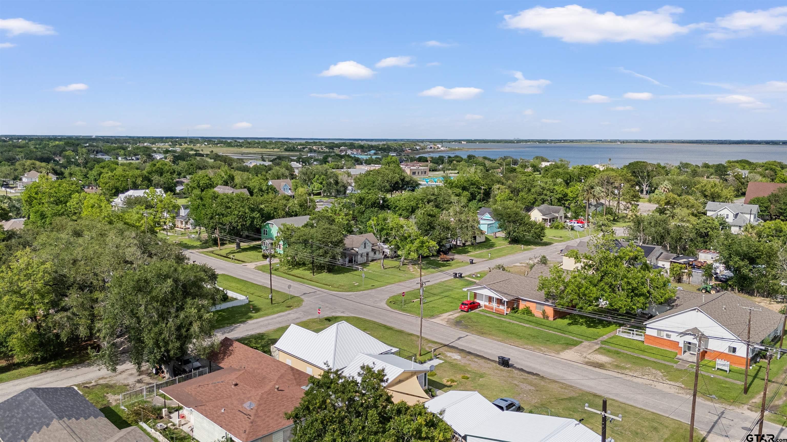 408 Morton Palacios, TX 77465 - Photo 23 of 29 an aerial view of a house with a yard
