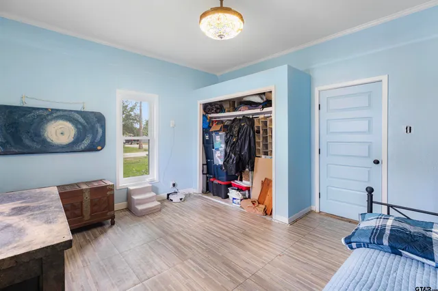 a view of livingroom with furniture and a window