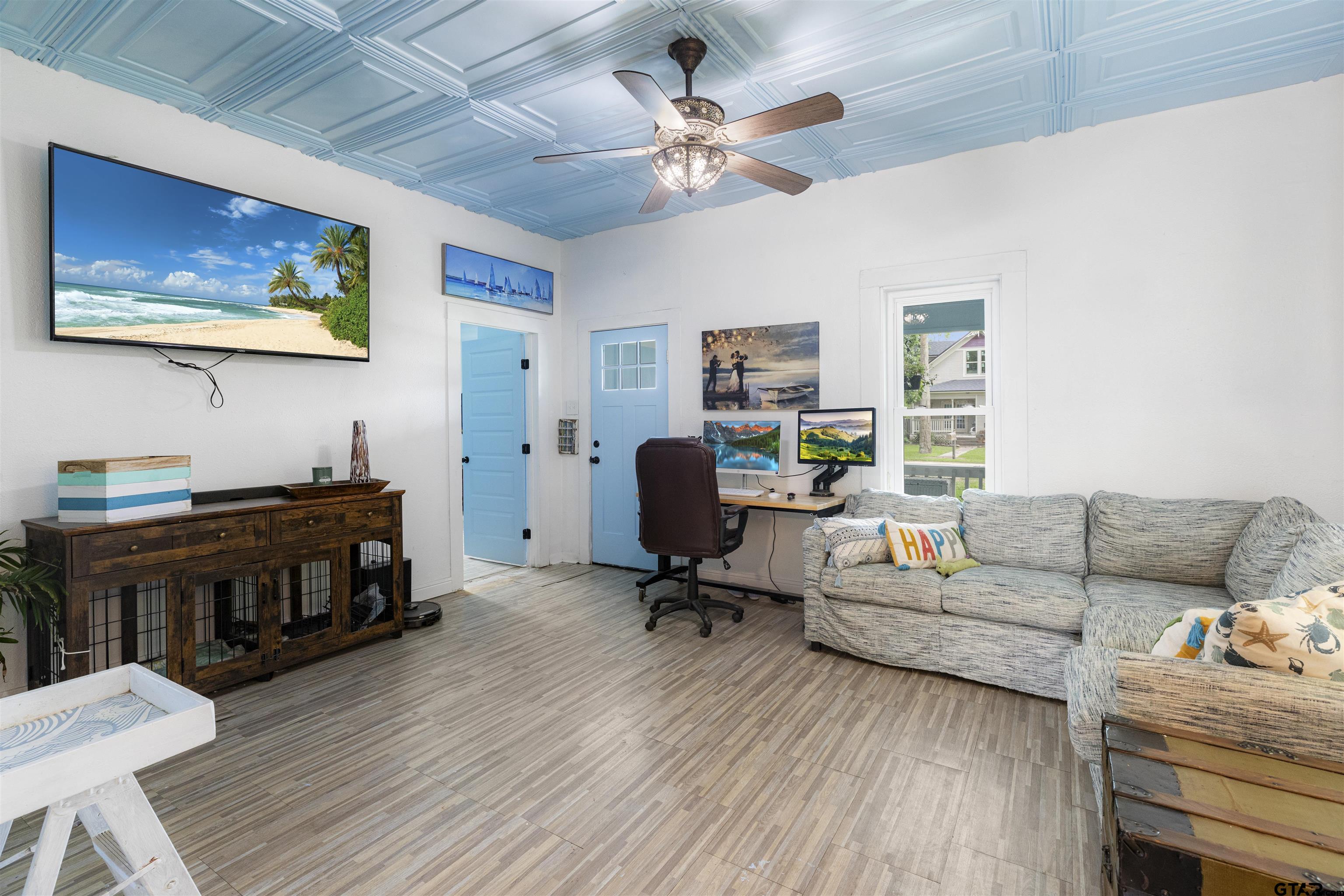 408 Morton Palacios, TX 77465 - Photo 8 of 29 a living room with furniture and wooden floor