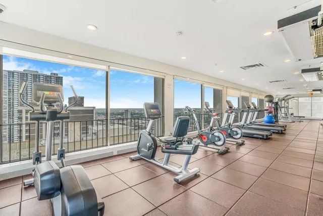 a view of roof with city view