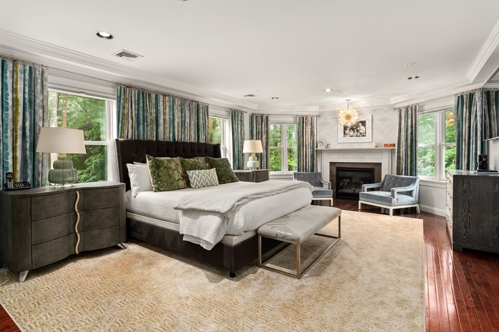 25 Westcliff Road Weston, MA 02493 - Photo 12 of 19 a bedroom with a large bed and a fireplace
