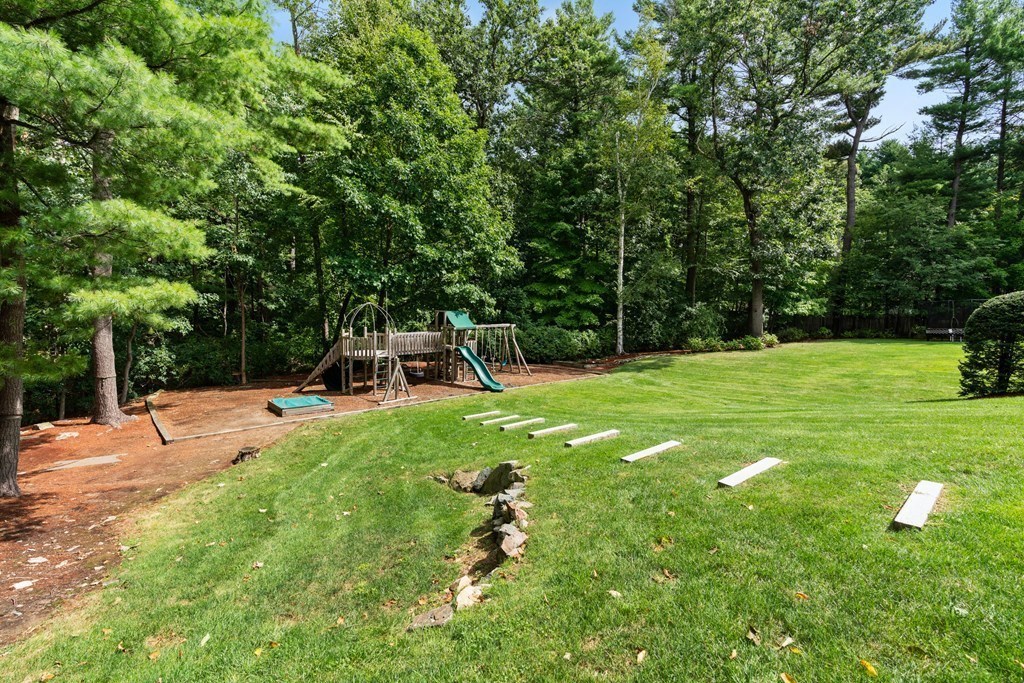 25 Westcliff Road Weston, MA 02493 - Photo 18 of 19 a view of a backyard with a garden