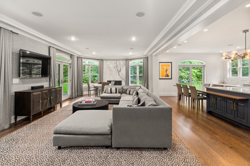 25 Westcliff Road Weston, MA 02493 - Photo 6 of 19 a living room with furniture flat screen tv and large windows