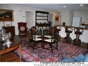 2467 Youngs Road Southern Pines, NC 28387 - Photo 4 of 12 a living room with furniture and wooden floor