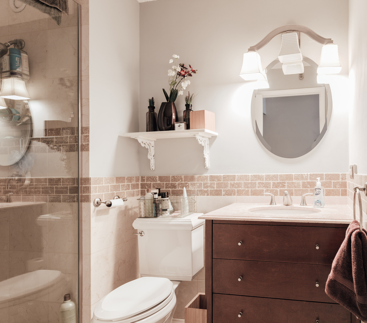 195 North Harbor Drive, Unit 905 Chicago, IL 60601 - Photo 7 of 19 a bathroom with a toilet a sink and mirror