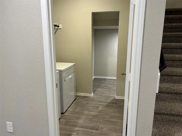 a view of a bathroom from the hallway