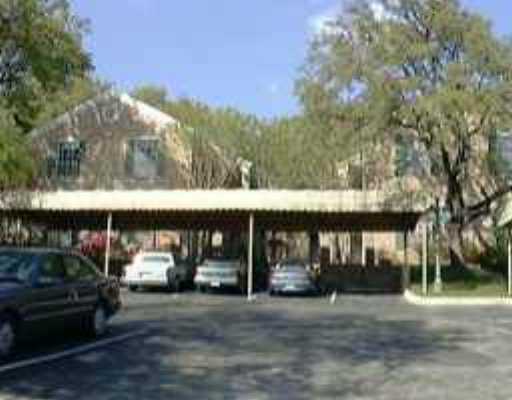 1706 Summit View Place, Unit 5 Austin, TX 78703 - Photo 1 of 1 a view of a car park in front of building