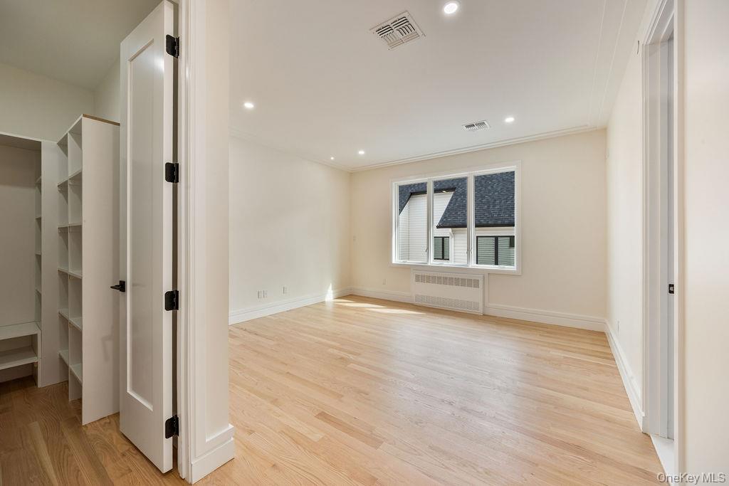 20 Singer Avenue, Unit 202 Spring Valley, NY 10977 - Photo 22 of 50 a view of livingroom with hardwood floor and window