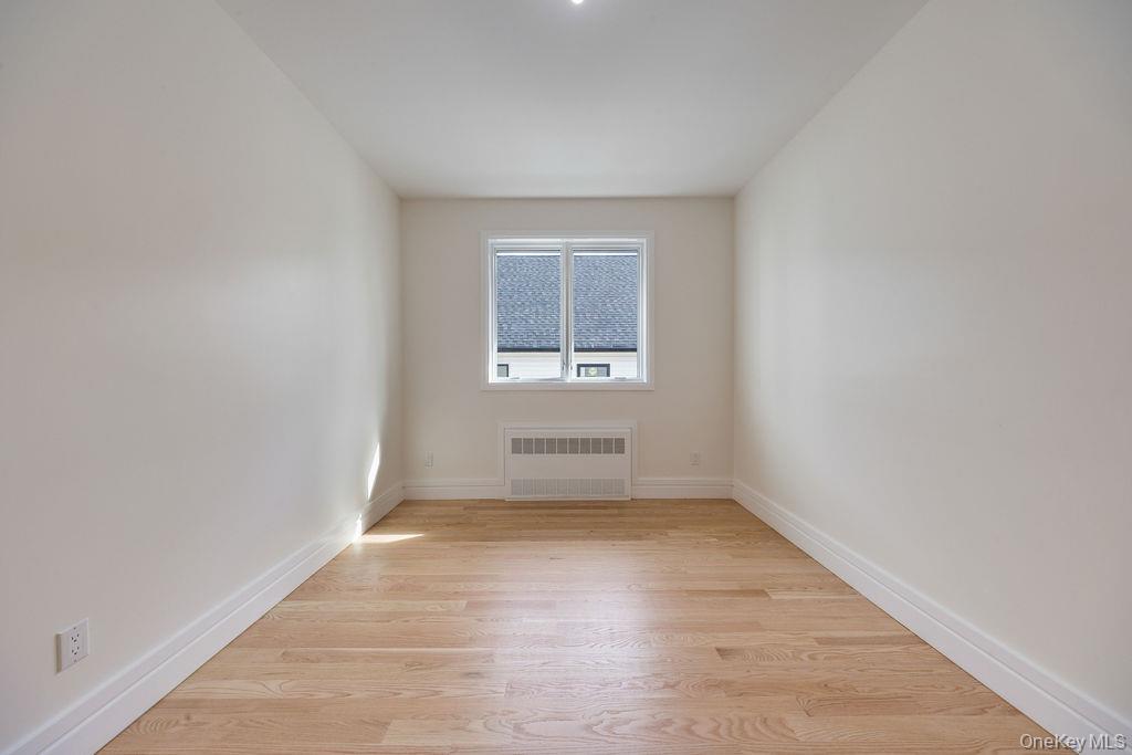 20 Singer Avenue, Unit 202 Spring Valley, NY 10977 - Photo 34 of 50 an empty room with a window