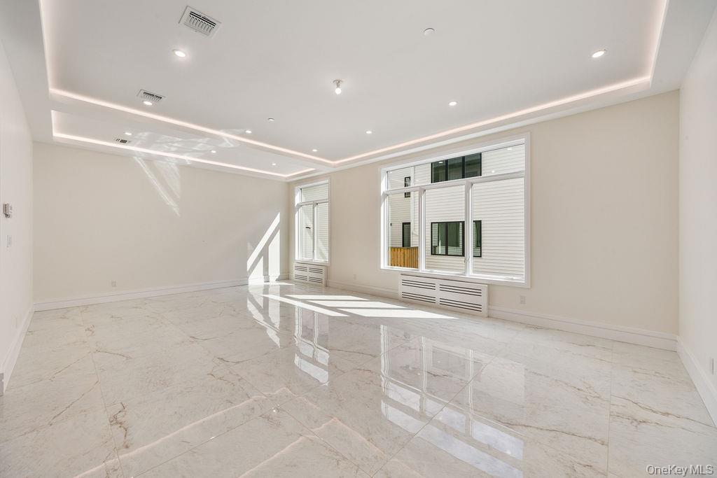 20 Singer Avenue, Unit 202 Spring Valley, NY 10977 - Photo 6 of 50 a view of an empty room with a window