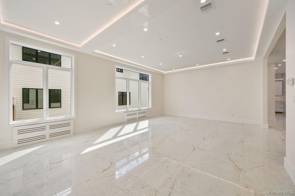 20 Singer Avenue, Unit 202 Spring Valley, NY 10977 - Photo 9 of 50 a view of an empty room with a window