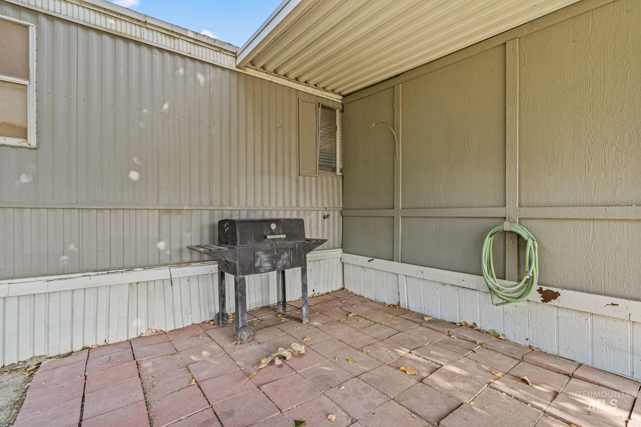 5015 East Ustick Road, Unit 181 Caldwell, ID 83605 - Photo 24 of 28 View of patio with grilling area