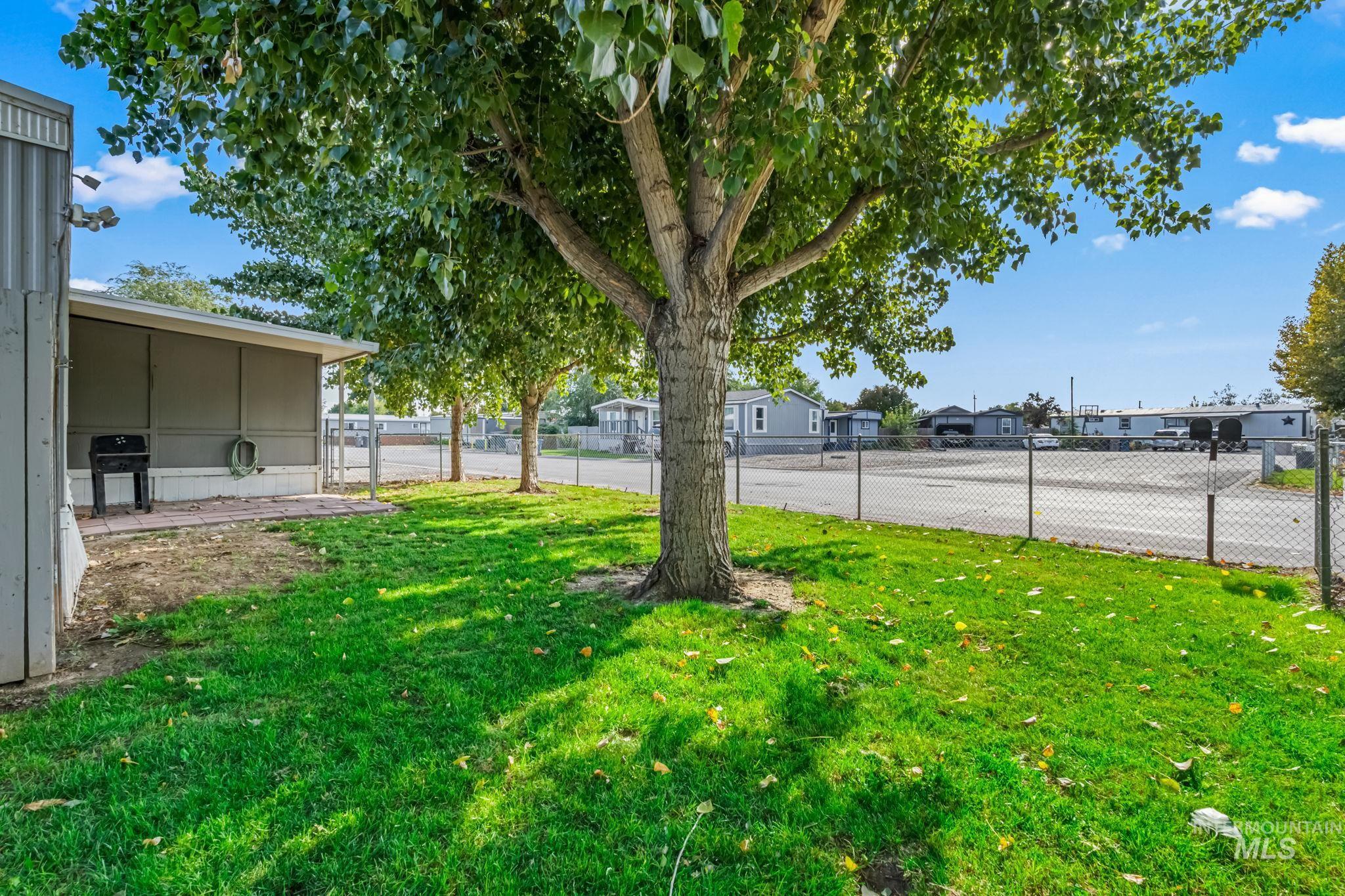 5015 East Ustick Road, Unit 181 Caldwell, ID 83605 - Photo 27 of 28 View of yard featuring a residential view