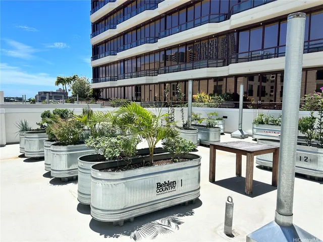 a view of building with outdoor seating