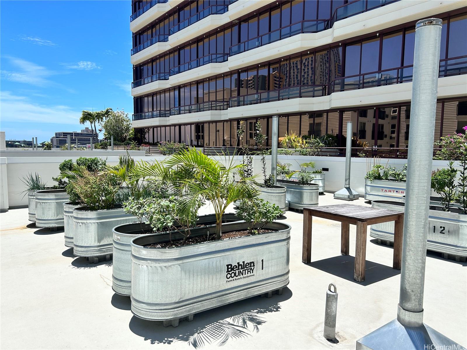 803 Waimanu Street, Unit 401 Honolulu, HI 96813 - Photo 11 of 18 a view of building with outdoor seating