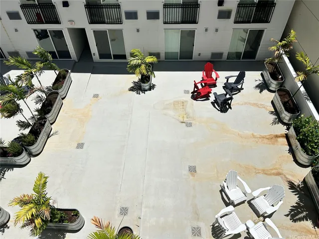a bathroom with a sink mirror and vanity