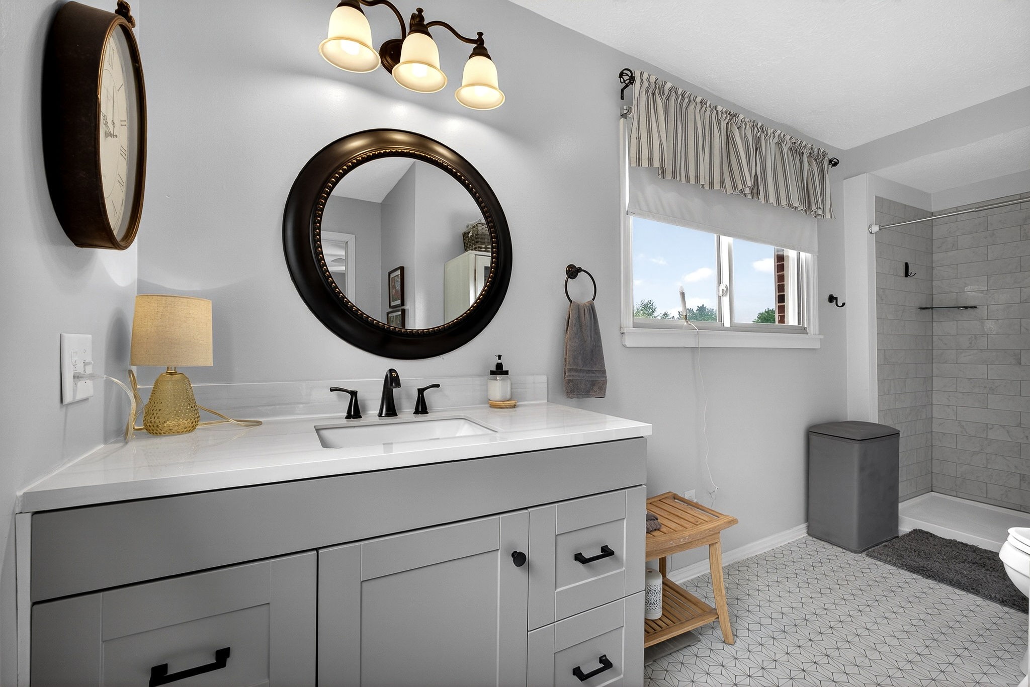 1755 Burgess Falls Road Sparta, TN 38583 - Photo 35 of 56 a bathroom with a sink and a mirror