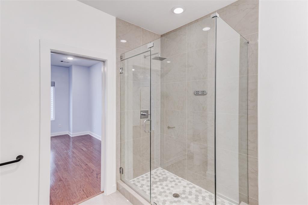 1925 California Drive, Unit 3 Dallas, TX 75204 - Photo 16 of 33 a bathroom with a shower and a sink