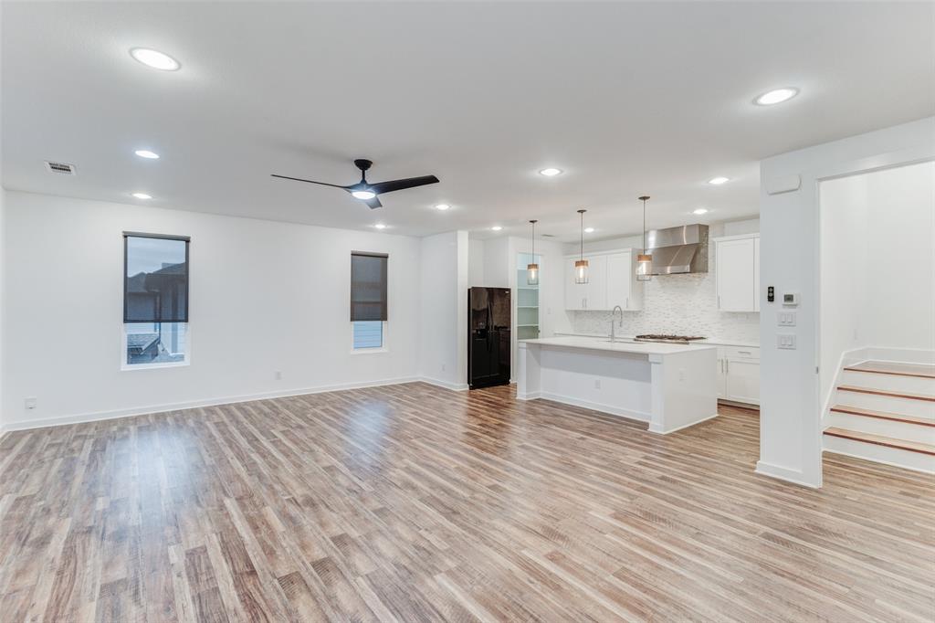 1925 California Drive, Unit 3 Dallas, TX 75204 - Photo 33 of 33 a view of kitchen with wooden floor and windows