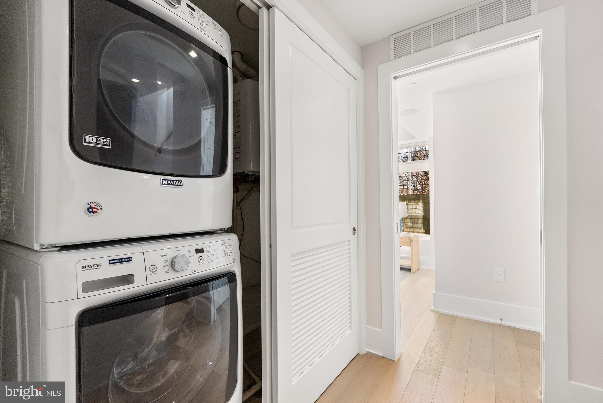 1001 Monroe Street Northwest, Unit 1 Washington, DC 20010 - Photo 14 of 23 a utility room with washer and dryer