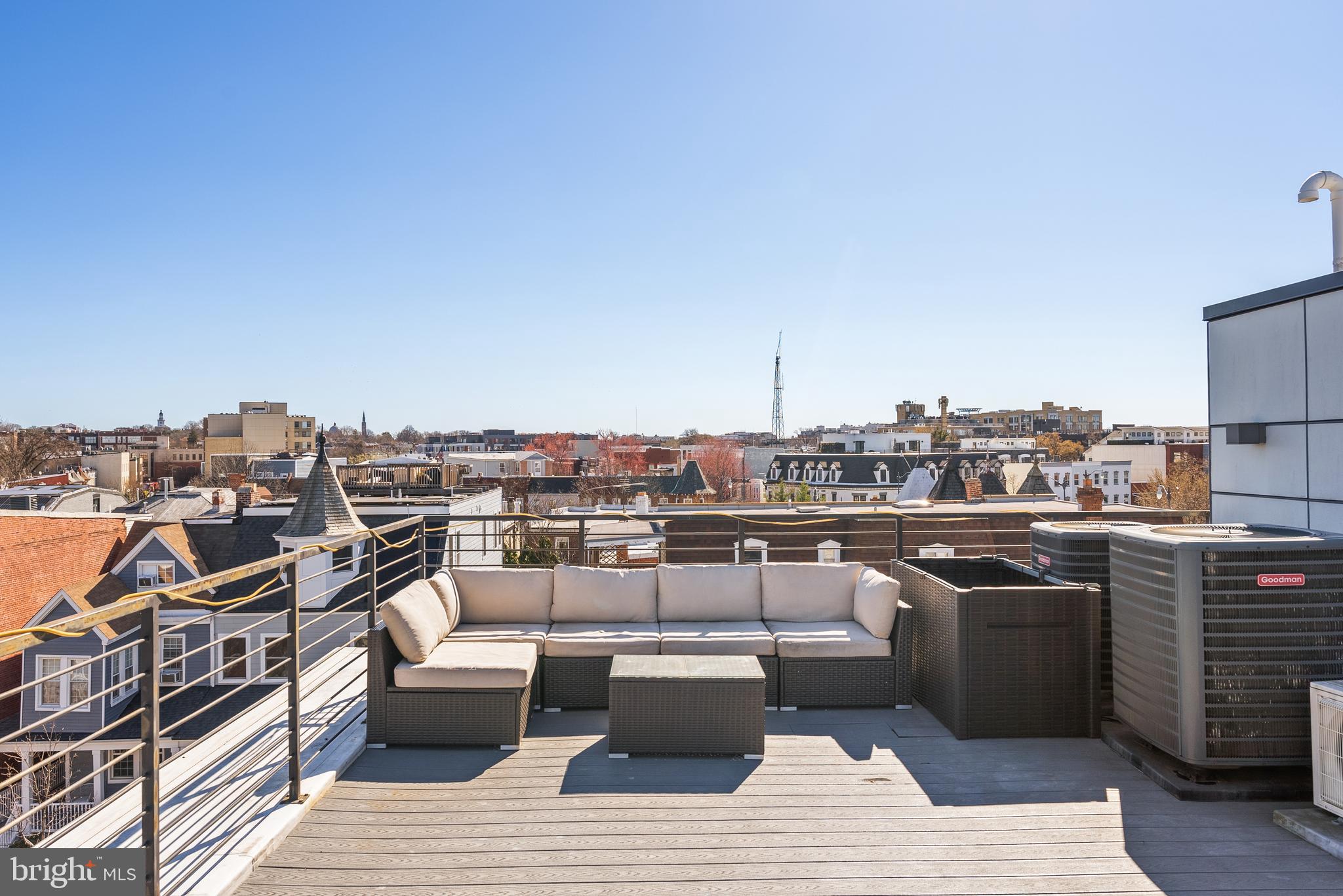 1001 Monroe Street Northwest, Unit 1 Washington, DC 20010 - Photo 18 of 23 a view of roof deck with seating space and kitchen view
