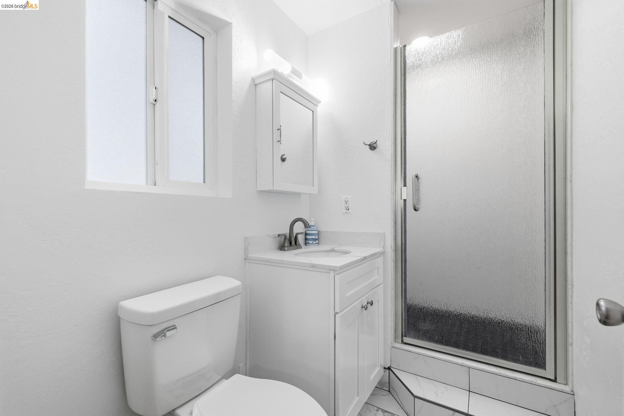 21999 Fallview Drive Sonora, CA 95370 - Photo 25 of 36 Bathroom with a stall shower and vanity