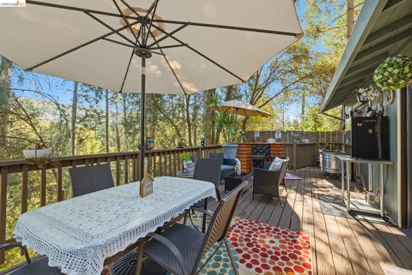 a view of balcony with furniture and outdoor seating