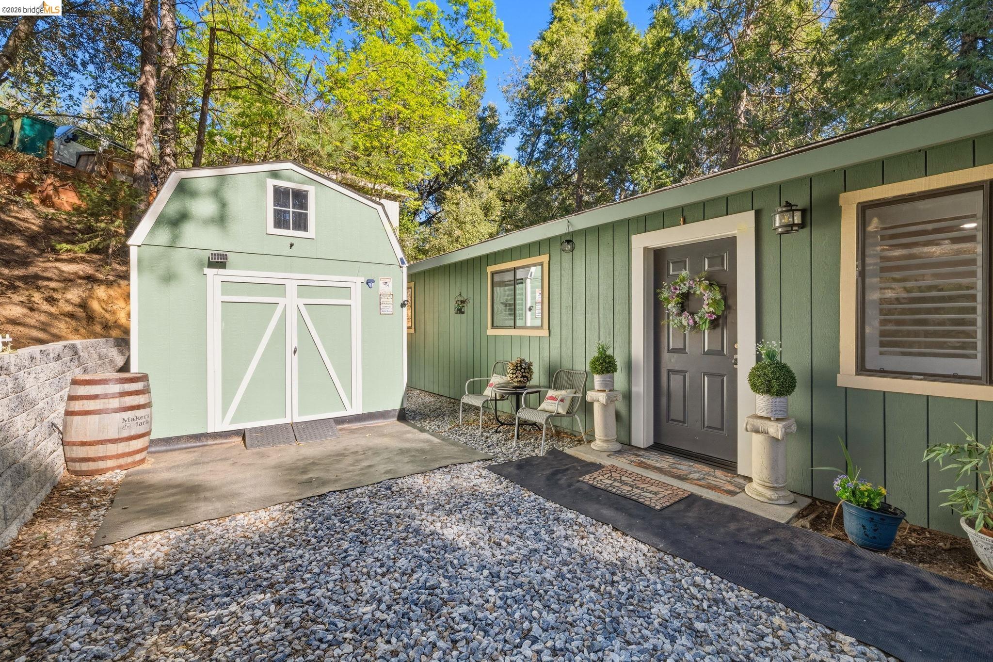 21999 Fallview Drive Sonora, CA 95370 - Photo 3 of 36 Property entrance with board and batten siding