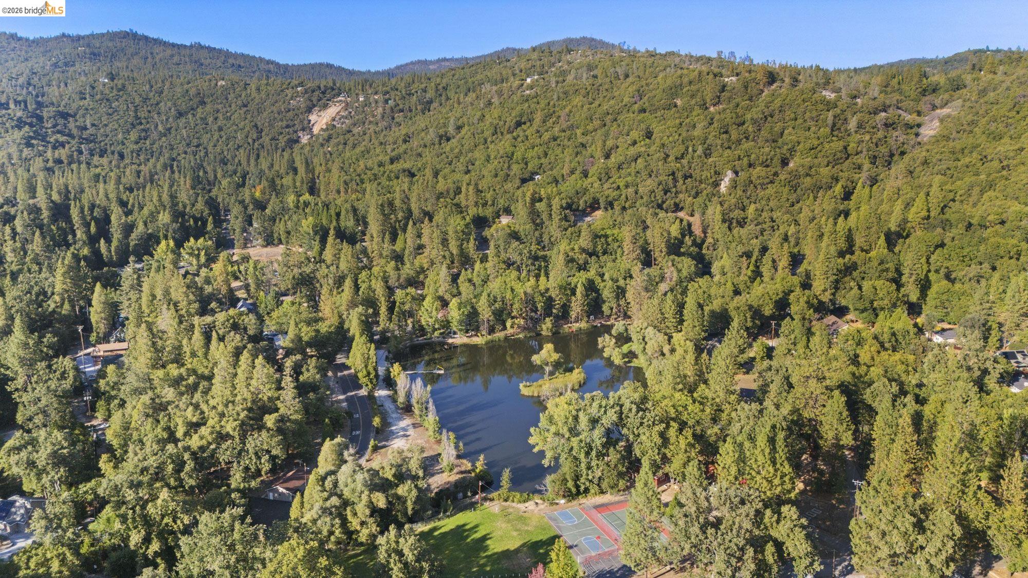 21999 Fallview Drive Sonora, CA 95370 - Photo 36 of 36 Bird's eye view of a water and mountain view and a heavily wooded area