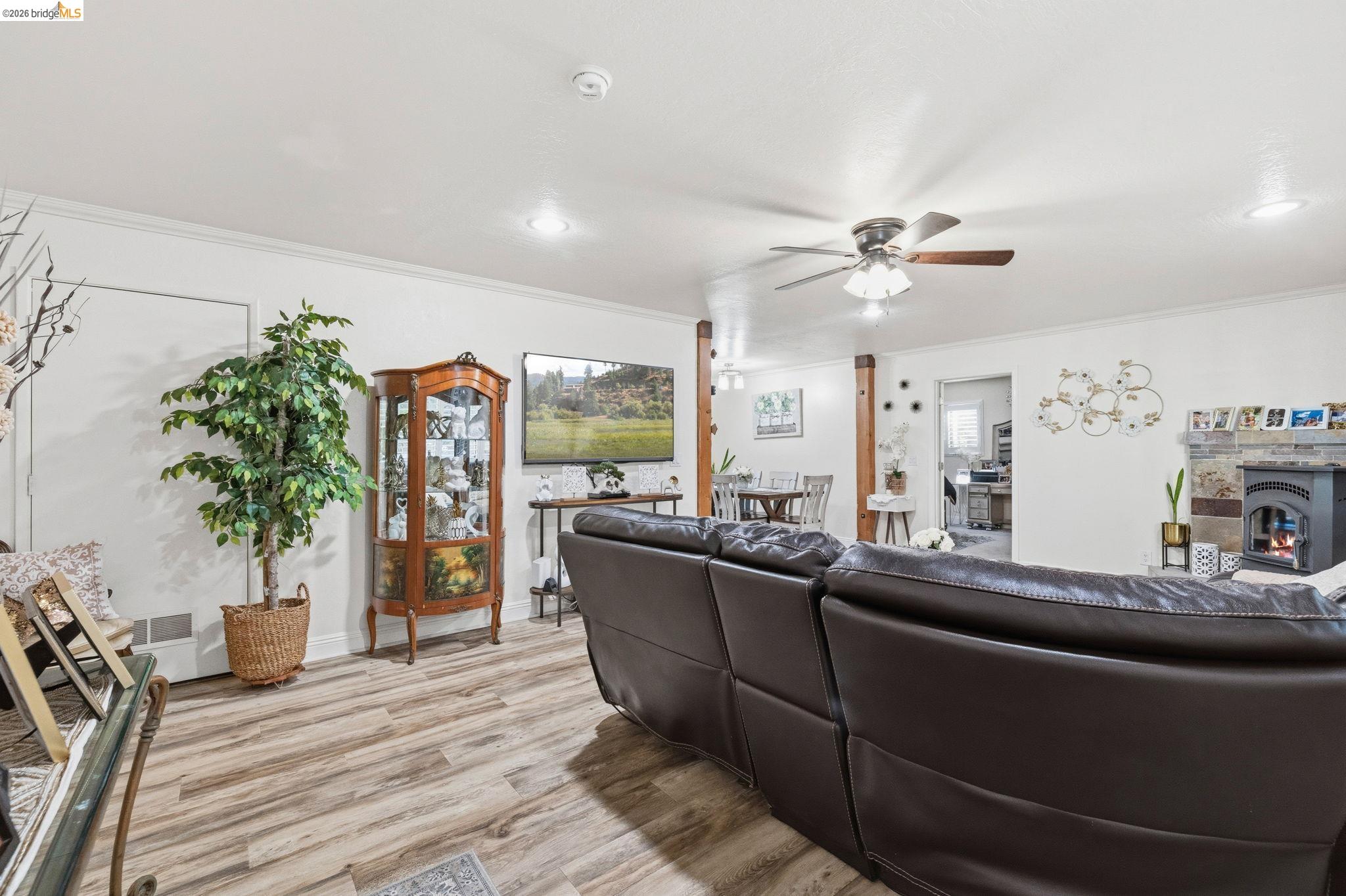 21999 Fallview Drive Sonora, CA 95370 - Photo 6 of 36 Living area with ceiling fan, light wood-style floors, ornamental molding, and recessed lighting