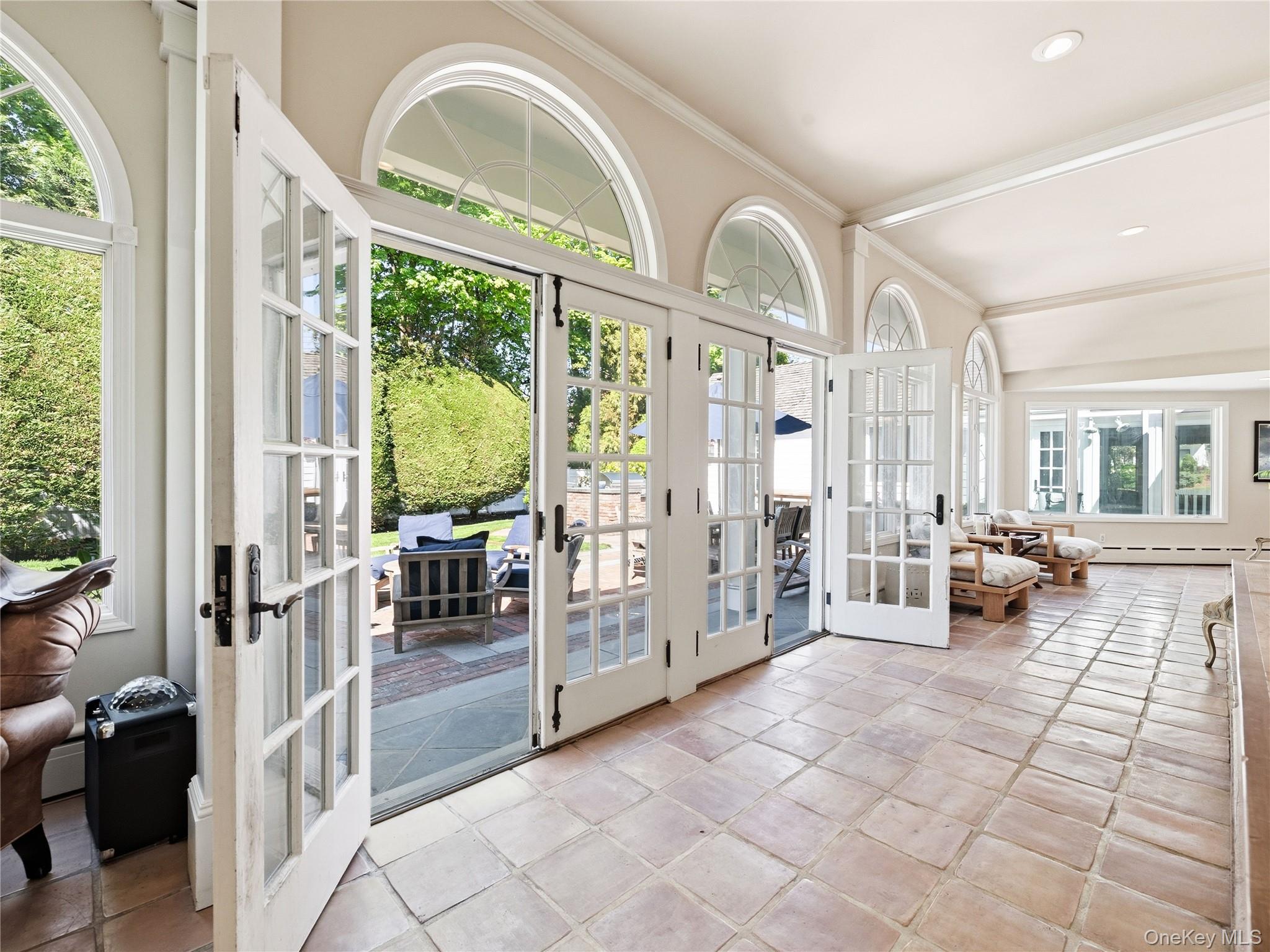 2 Aspen Place Great Neck, NY 11021 - Photo 18 of 48 Expansive Sunroom Overlooking the Lush Yard