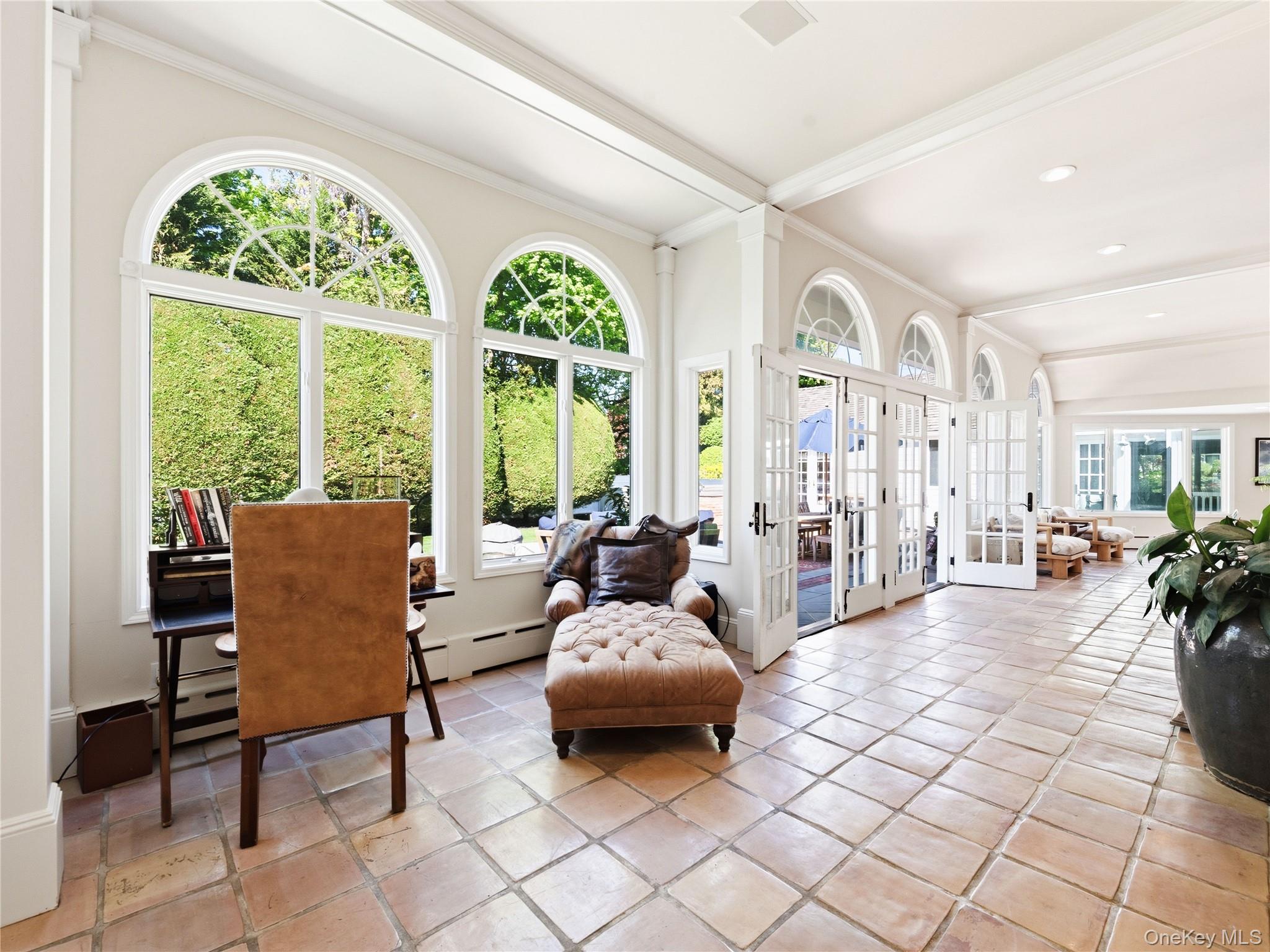 2 Aspen Place Great Neck, NY 11021 - Photo 19 of 48 Expansive Sunroom Overlooking the Lush Yard