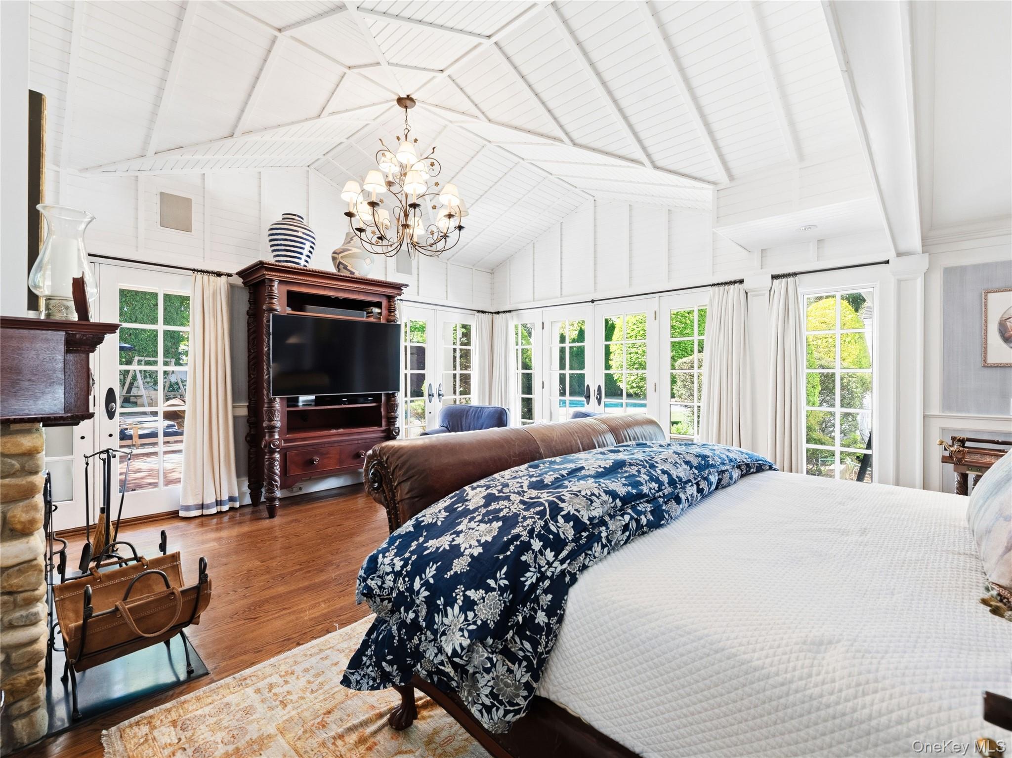 2 Aspen Place Great Neck, NY 11021 - Photo 21 of 48 Primary Bedroom with Pool Views and Direct Pool Access via French Doors