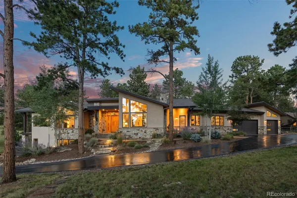 a house view with swimming pool and sitting space
