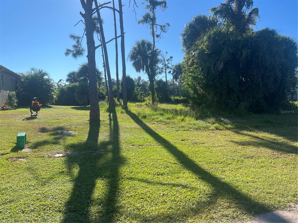 22 Tournament Road Rotonda West, FL 33947 - Photo 2 of 2 a view of a lake view