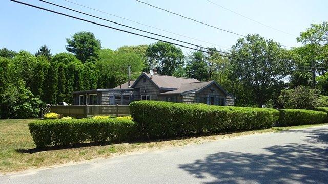 21 Cahoon Road Buzzards Bay, MA 02532 - Photo 3 of 34 a front view of a house with a yard
