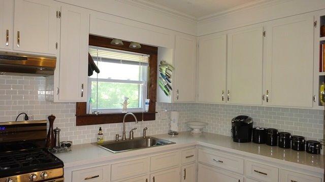 21 Cahoon Road Buzzards Bay, MA 02532 - Photo 8 of 34 a kitchen with a sink and cabinets