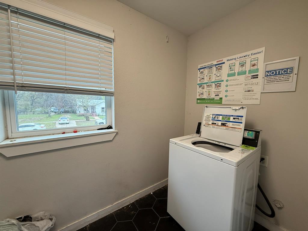 5928 Fletcher Avenue, Unit 16 Fort Worth, TX 76107 - Photo 16 of 20 a view of workspace with a window