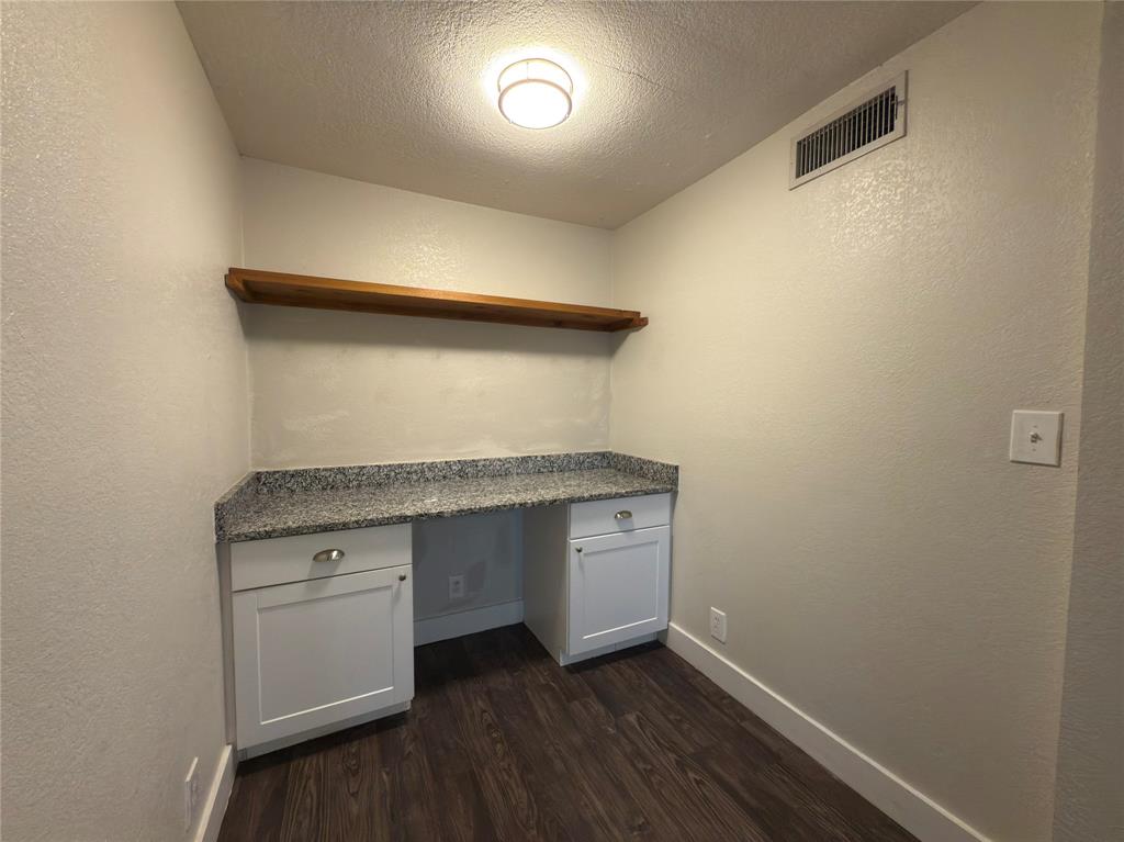 5928 Fletcher Avenue, Unit 16 Fort Worth, TX 76107 - Photo 10 of 20 a hallway with washer and dryer