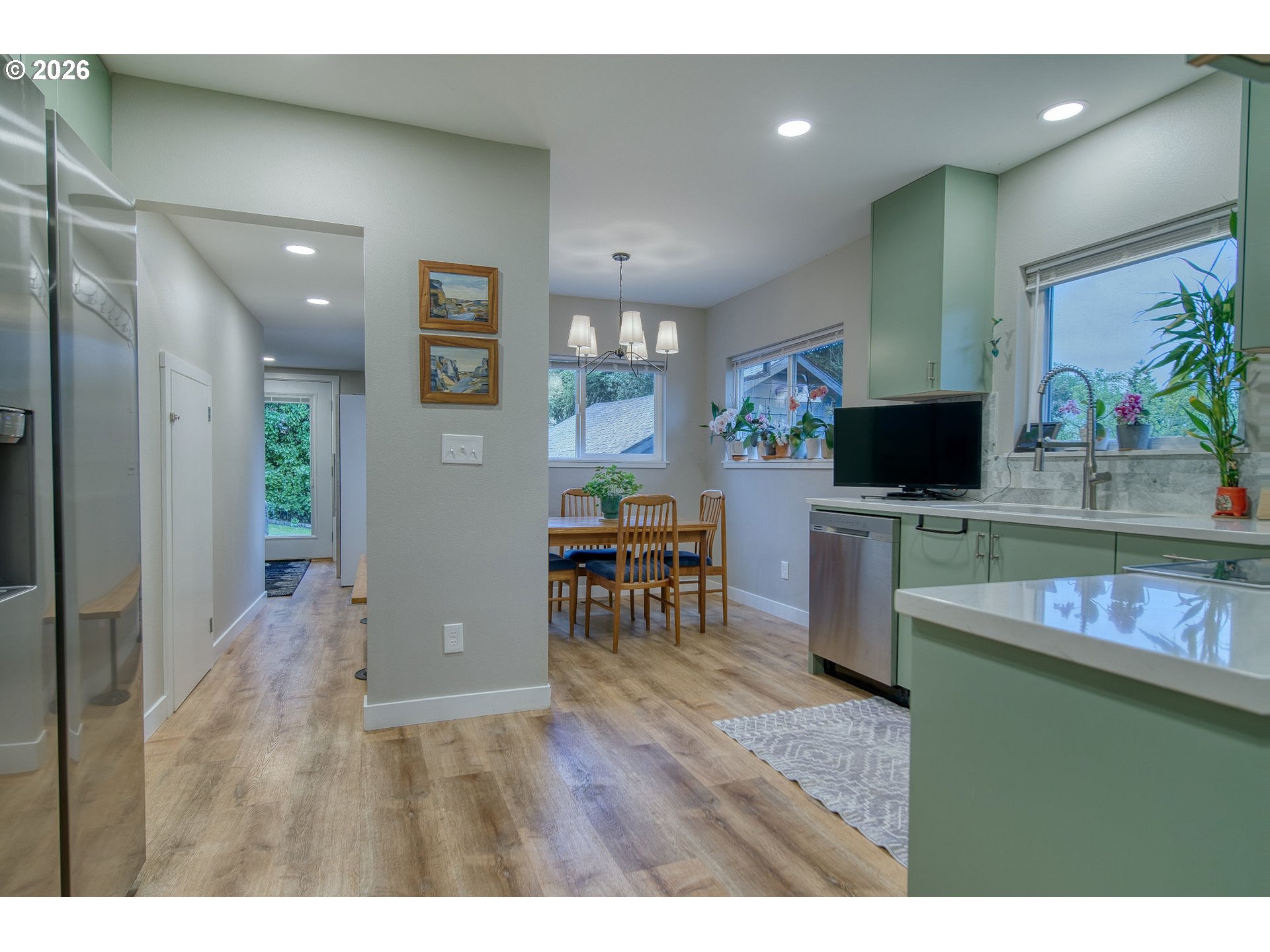 274 North 3rd Street St. Helens, OR 97051 - Photo 11 of 30 a living room with stainless steel appliances furniture and a flat screen tv