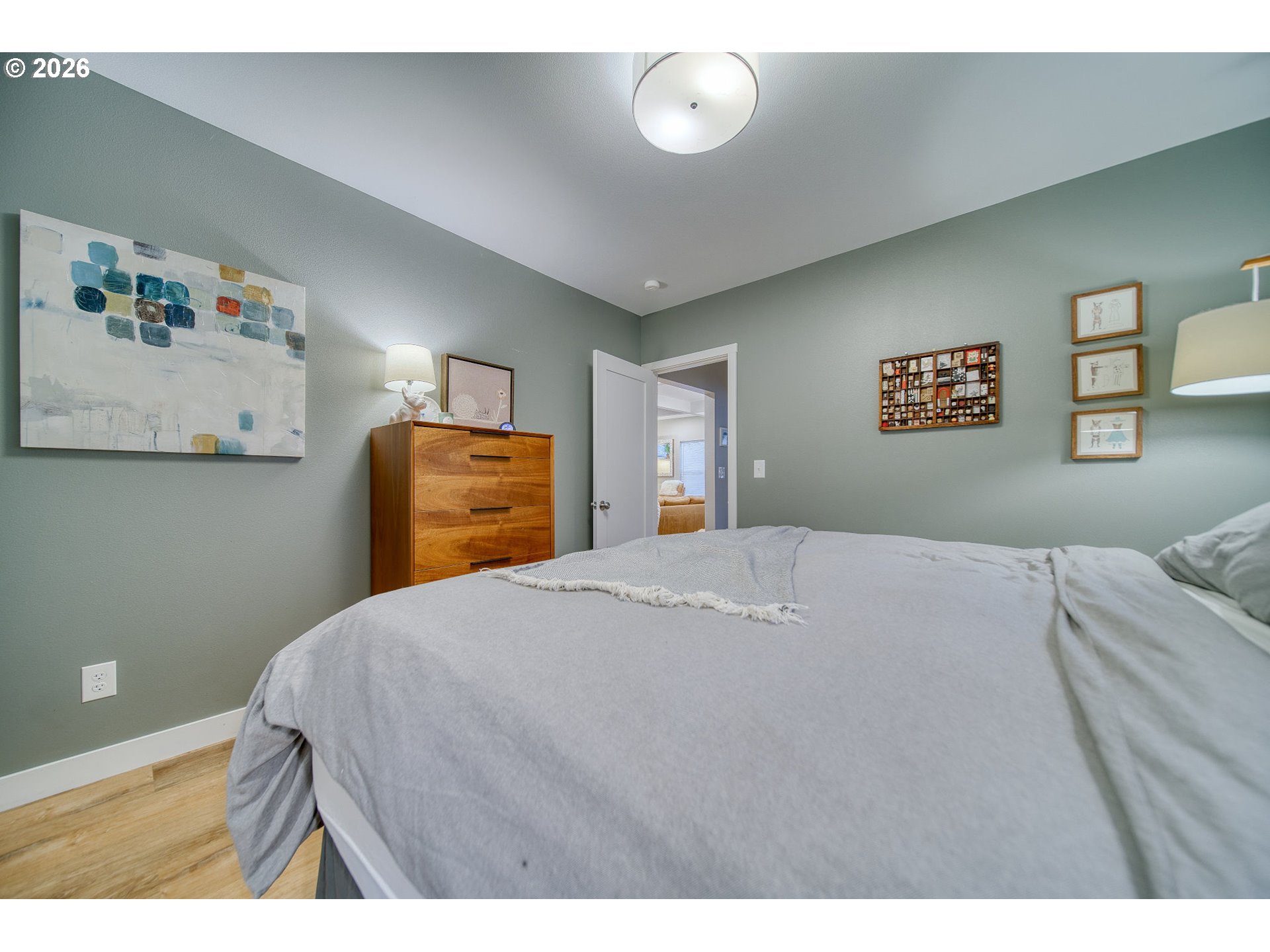 274 North 3rd Street St. Helens, OR 97051 - Photo 12 of 30 a bedroom with a bed and a cabinets