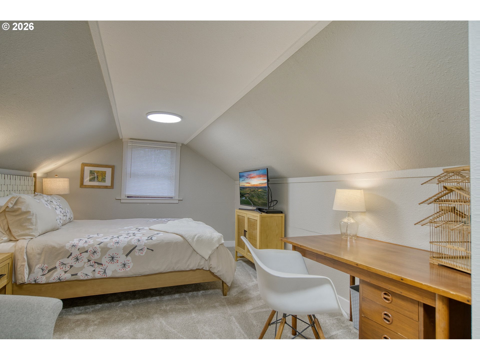 274 North 3rd Street St. Helens, OR 97051 - Photo 21 of 30 a bedroom with a bed and a night stand