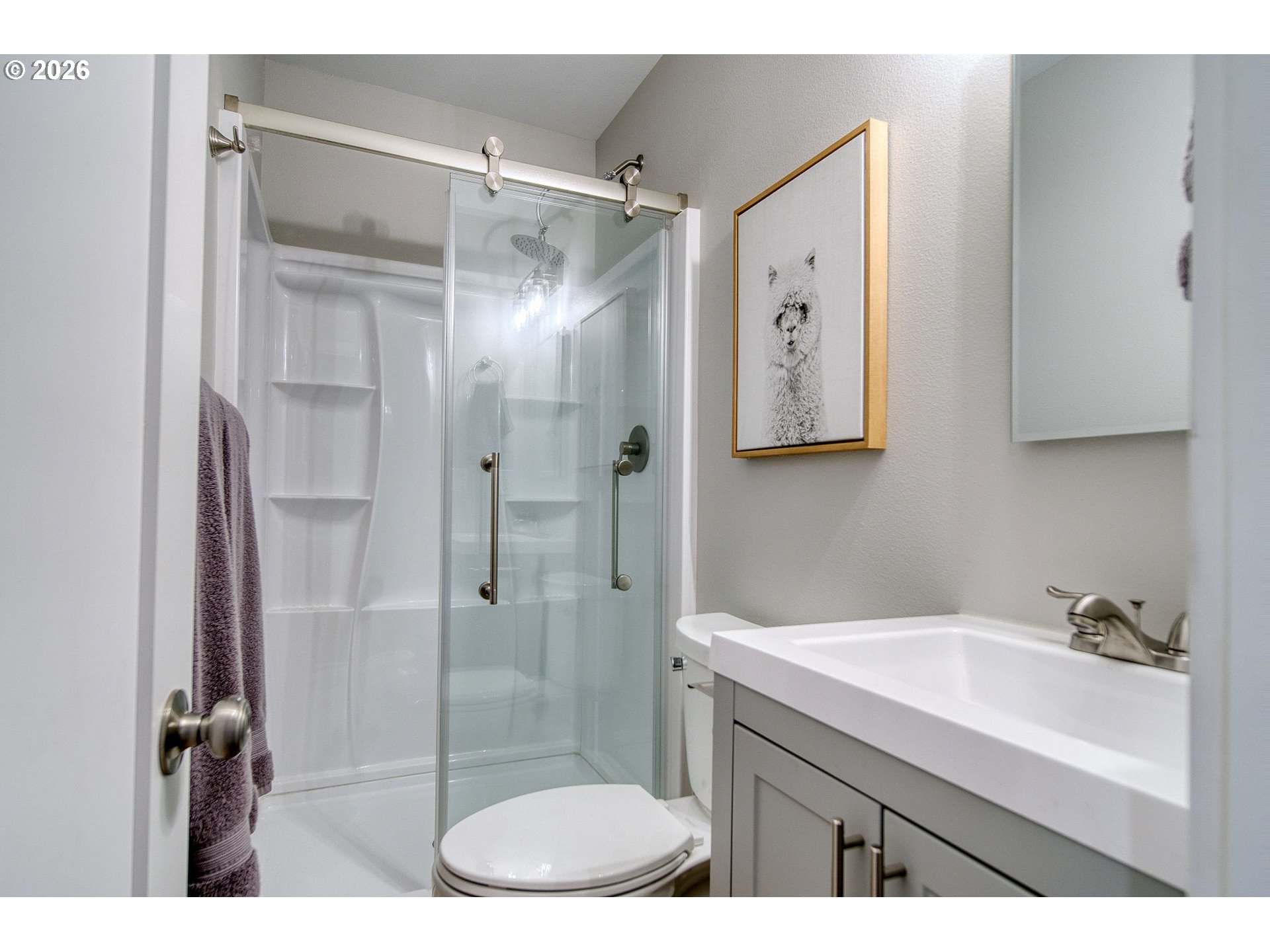 274 North 3rd Street St. Helens, OR 97051 - Photo 23 of 30 a bathroom with a sink and a shower