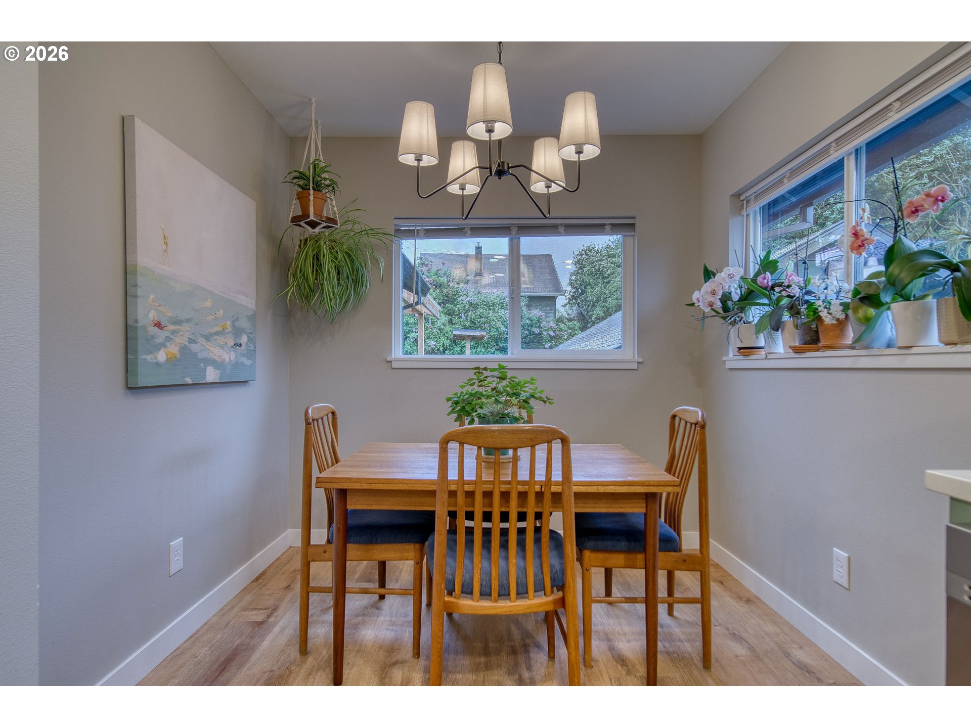 274 North 3rd Street St. Helens, OR 97051 - Photo 10 of 30 a view of a dining room with furniture a chandelier and wooden floor