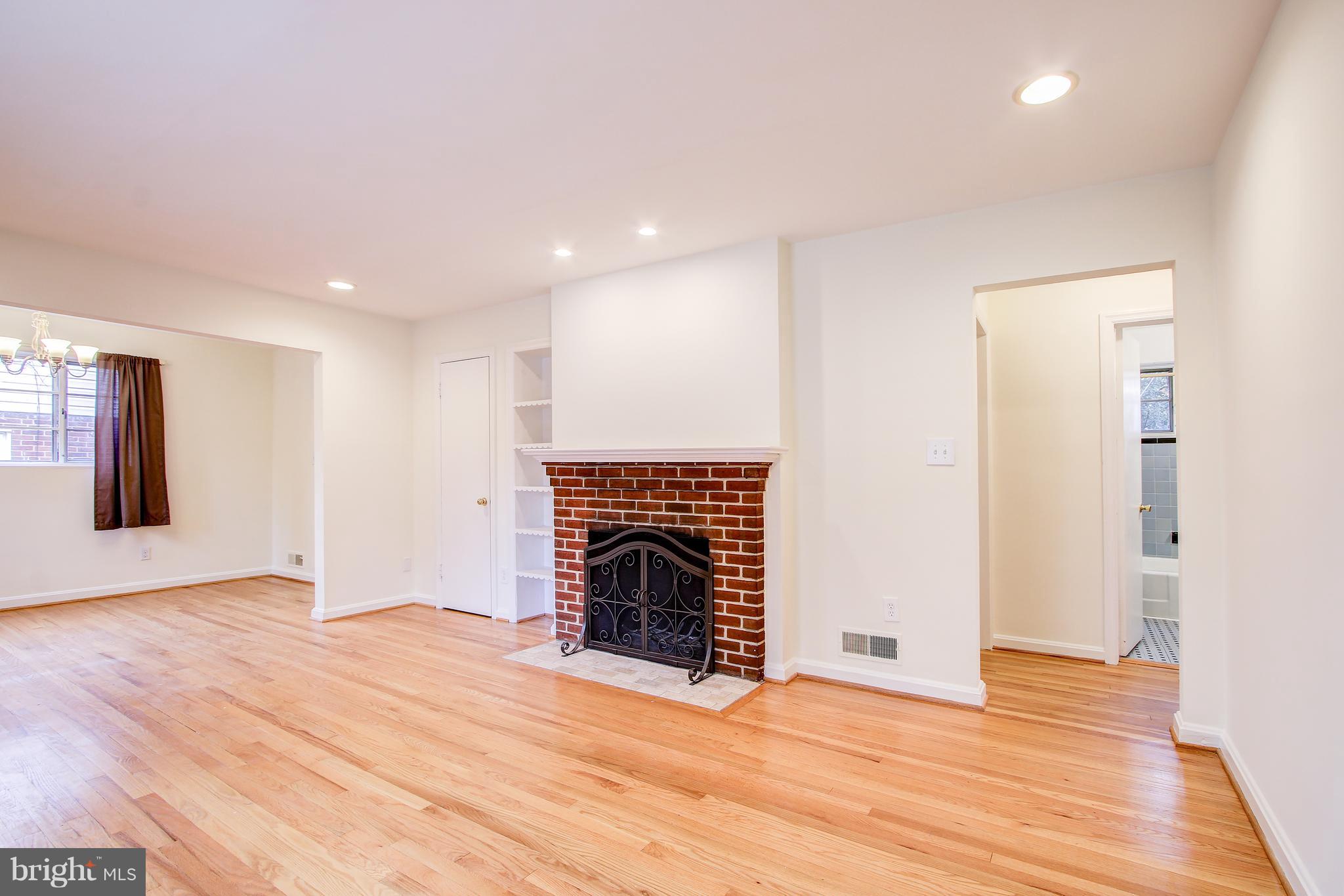 2420 Homestead Drive Silver Spring, MD 20902 - Photo 5 of 31 Living room w/wood burning fireplace